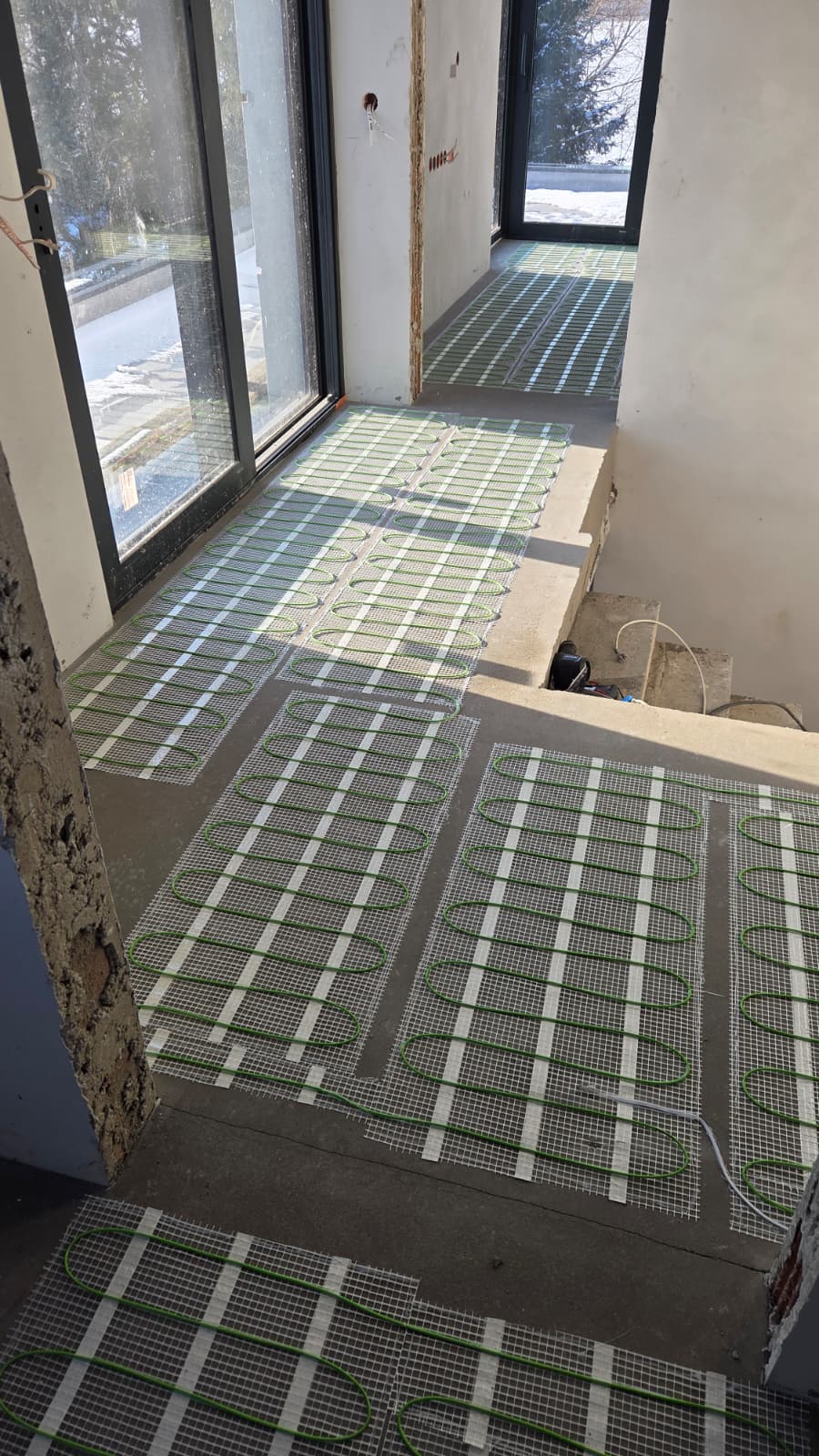 Pierwszy etap ogrzewania bezpośredniego w Zarzęcinie - maty grzewcze