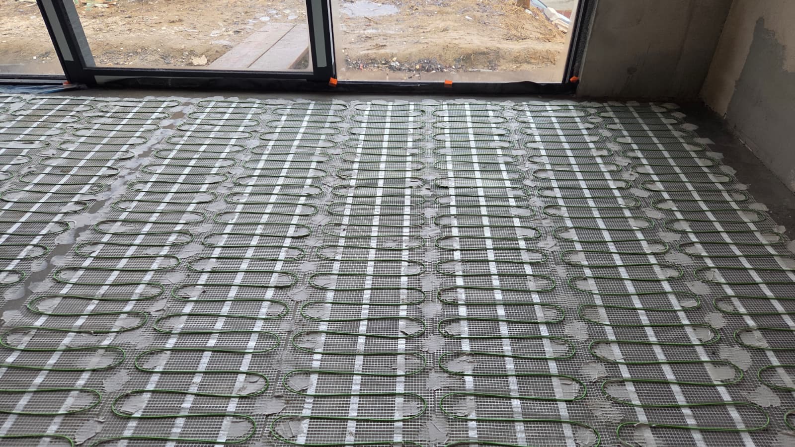 Dom ogrzewany matami grzewczymi w Chrośnie