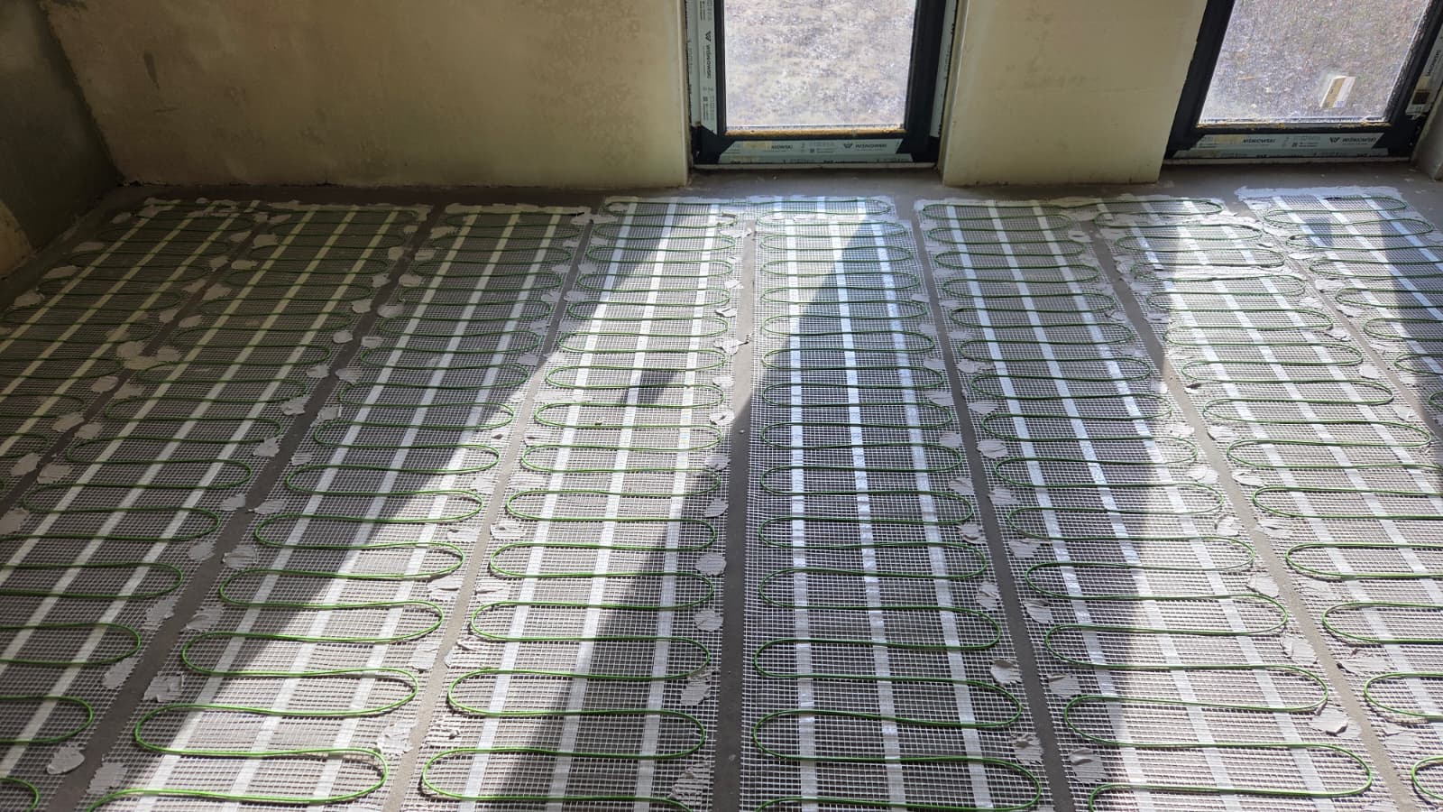 Dom ogrzewany matami grzewczymi w Chrośnie