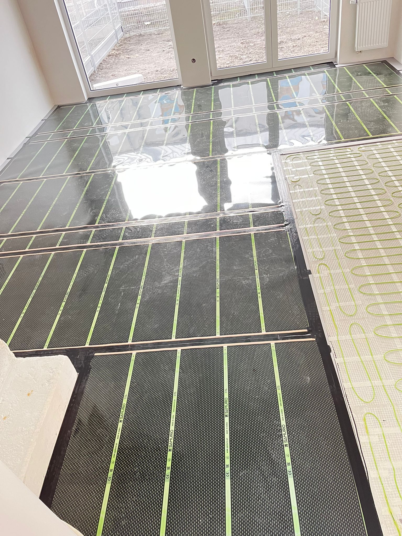 Folie i maty grzewcze w mieszkaniu w Słominie