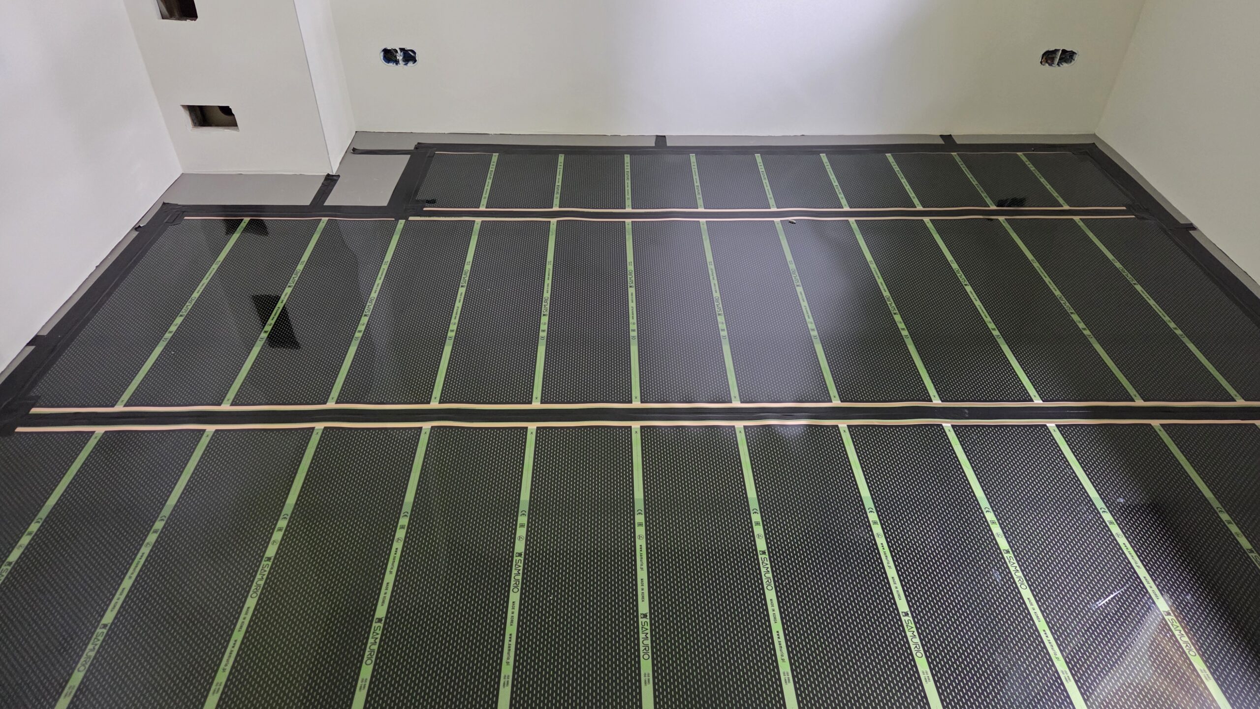 Nowoczesne ogrzewanie elektryczne oparte na foliach i matach grzewczych w domu o powierzchni blisko 100 m² we Frelichowie