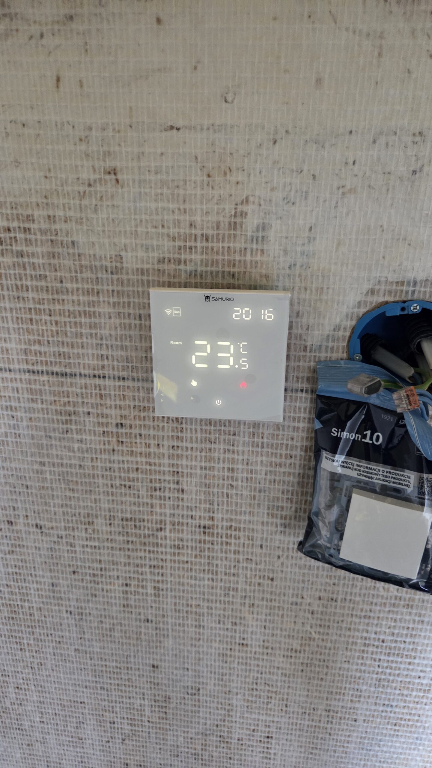Nowoczesne ogrzewanie elektryczne oparte na foliach i matach grzewczych w domu 70 m² w Przyborowie