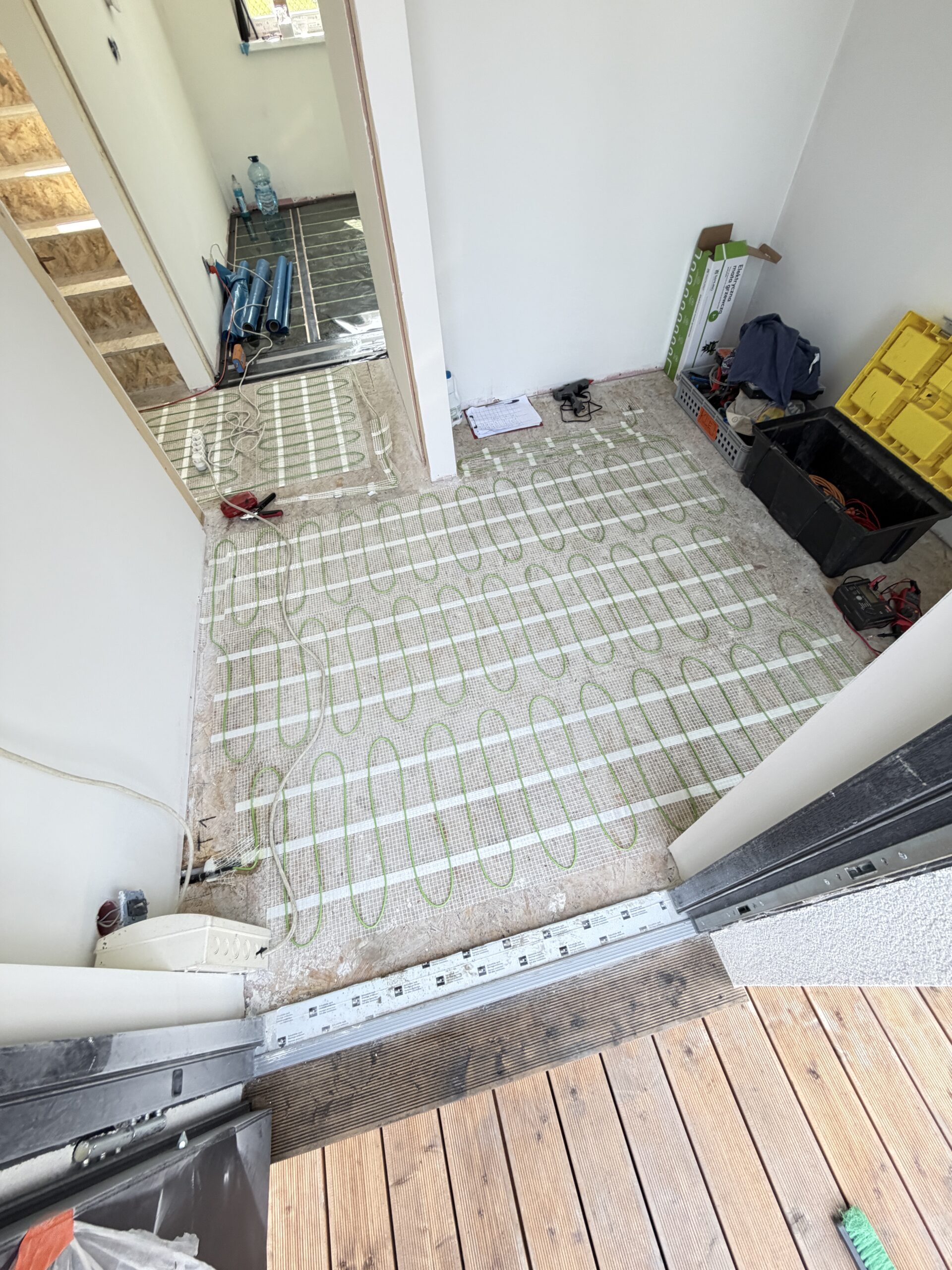 Ogrzewanie foliami i matami grzewczymi w domu 70 m² w Nadmie