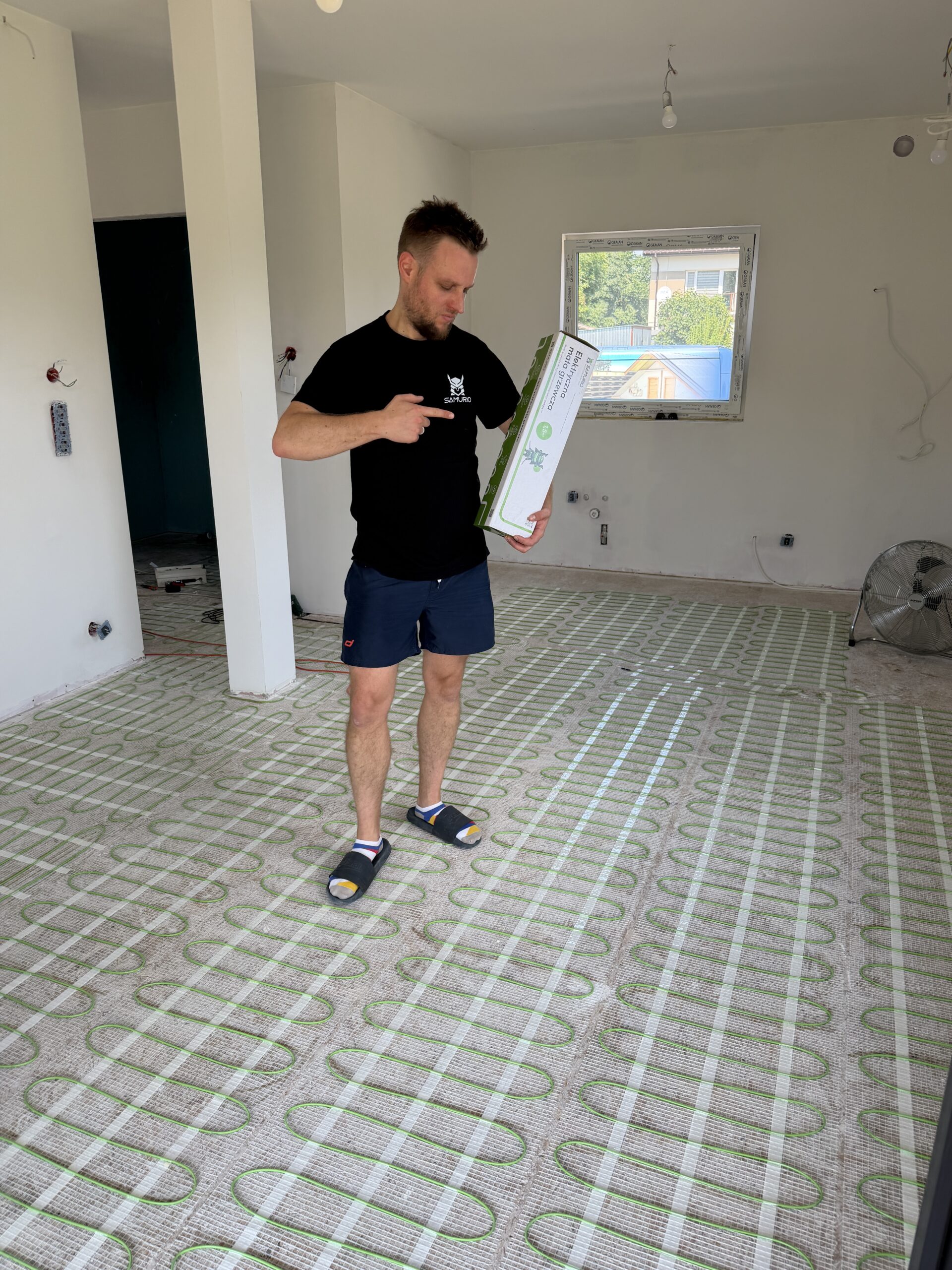 Ogrzewanie foliami i matami grzewczymi w domu 70 m² w Nadmie