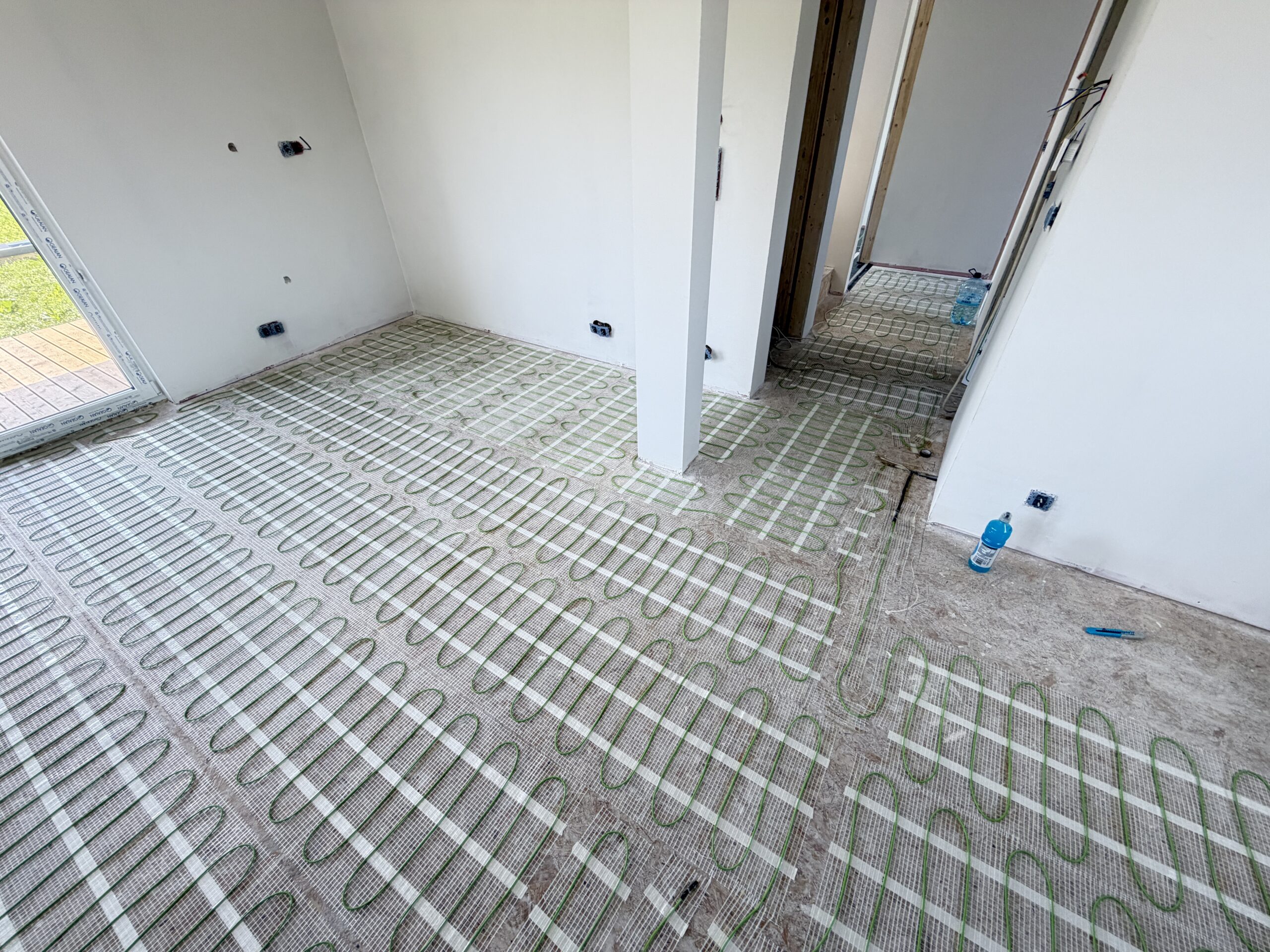 Ogrzewanie foliami i matami grzewczymi w domu 70 m² w Nadmie