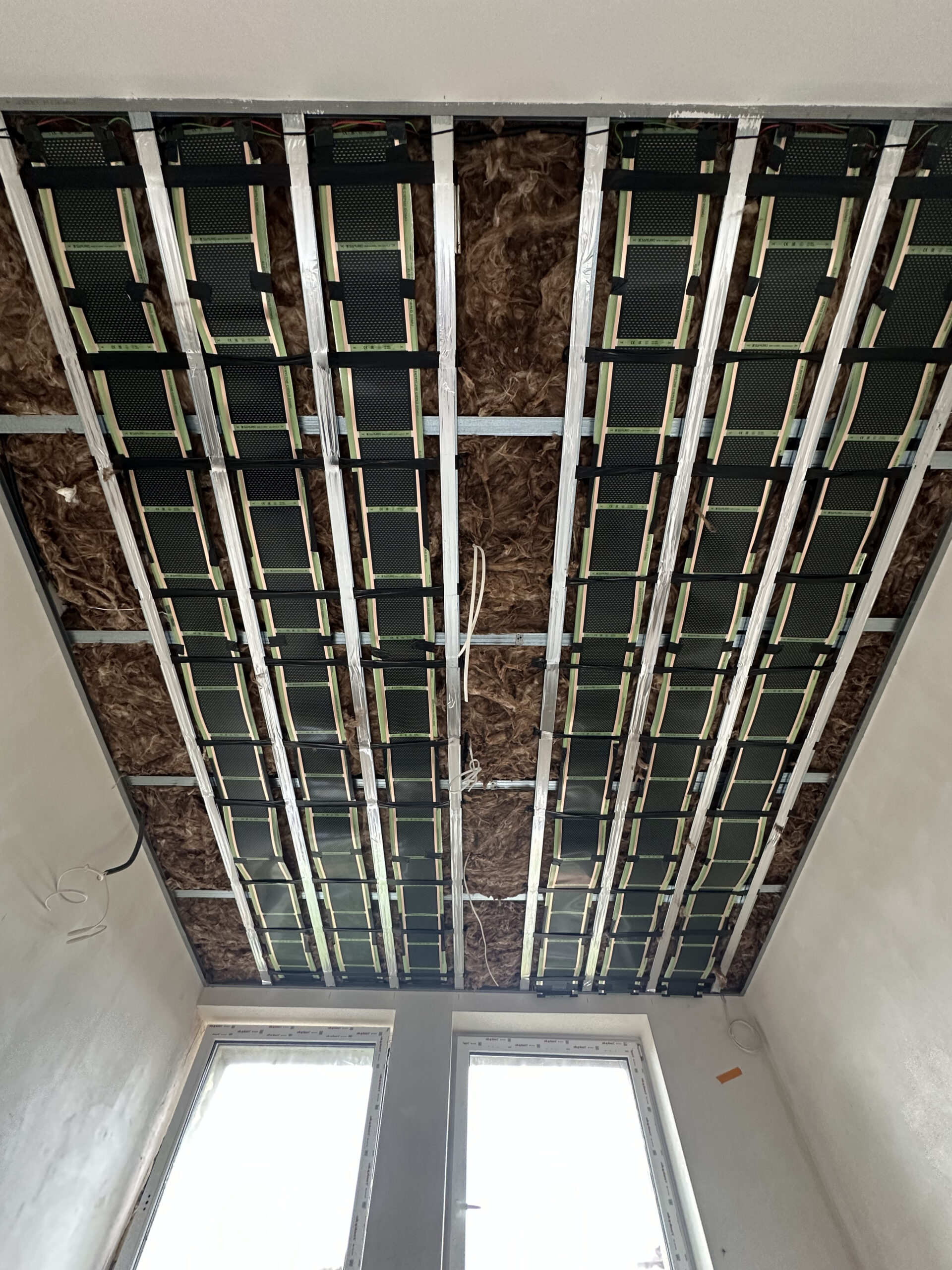 Folie grzewcze sufitowe w lokalu usługowym o powierzchni 60 m² w Kłodzku