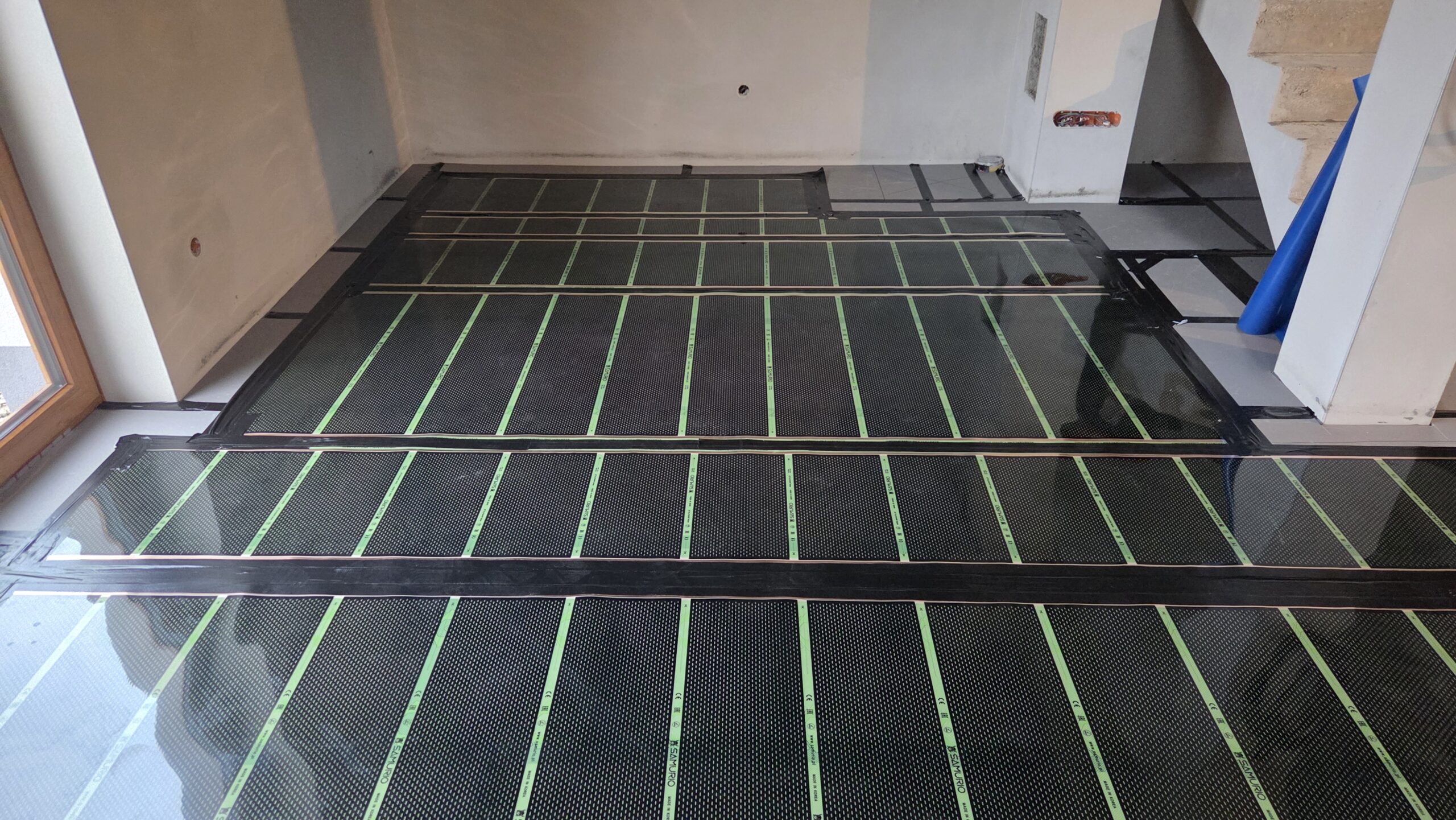 Połączenie folii i mat grzewczych w domu blisko 100 m² w Kroczycach