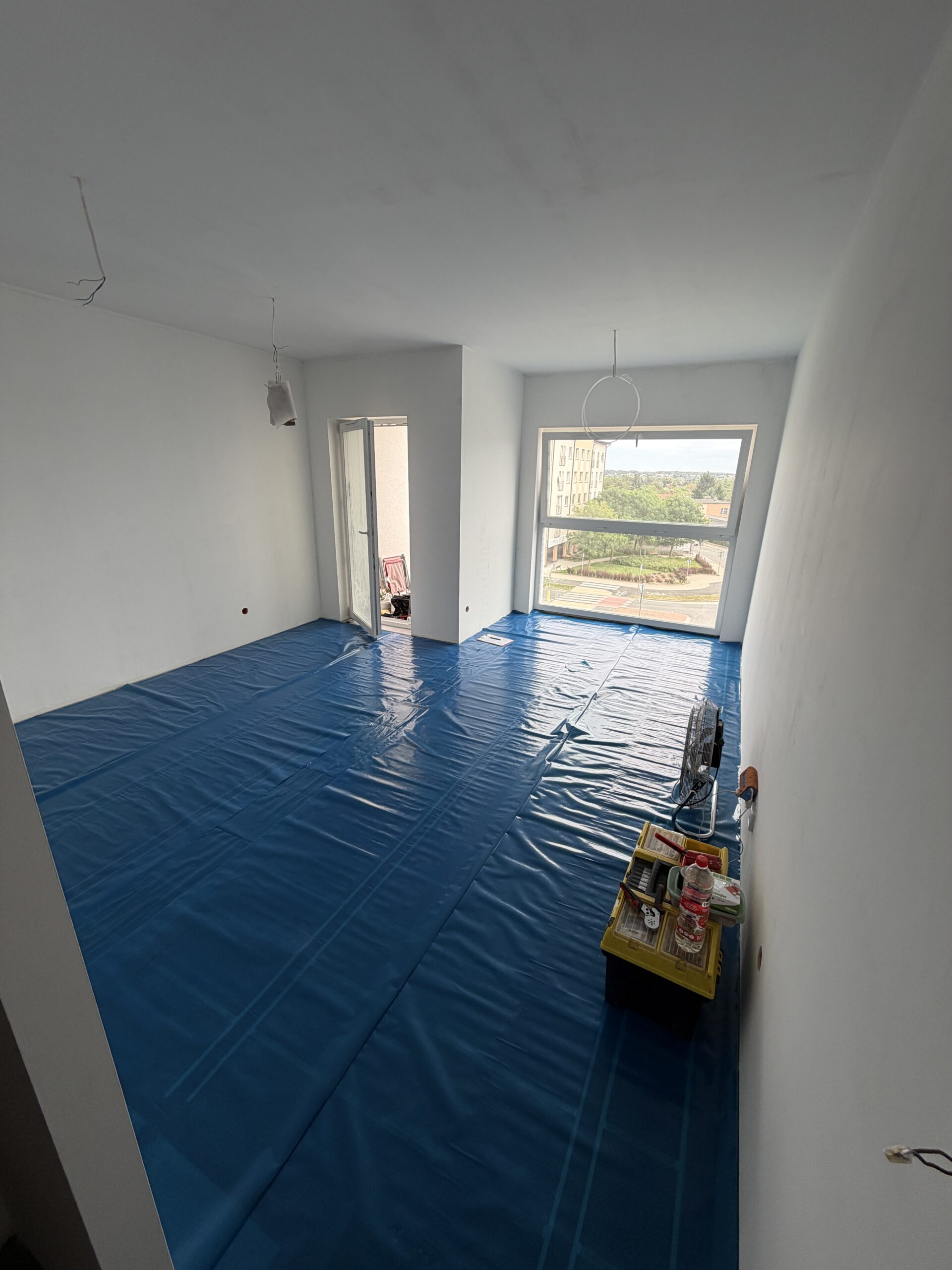 Folie grzewcze w mieszkaniu o powierzchni 26 m² w Luboniu